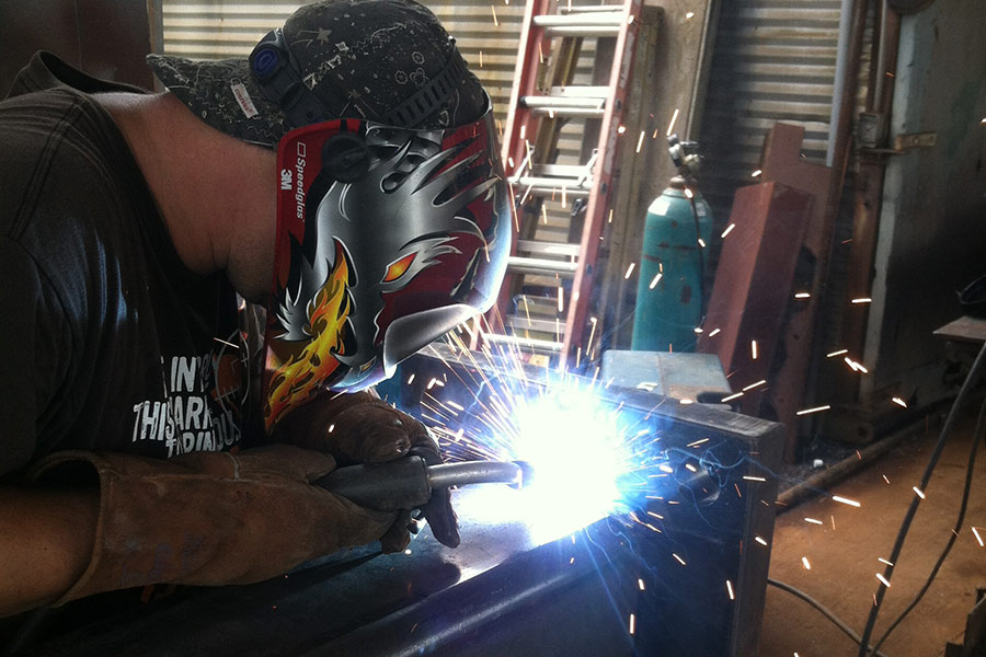 welder-with-decorative-welding-mask-working